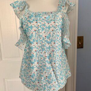 blue and white floral sleeveless top